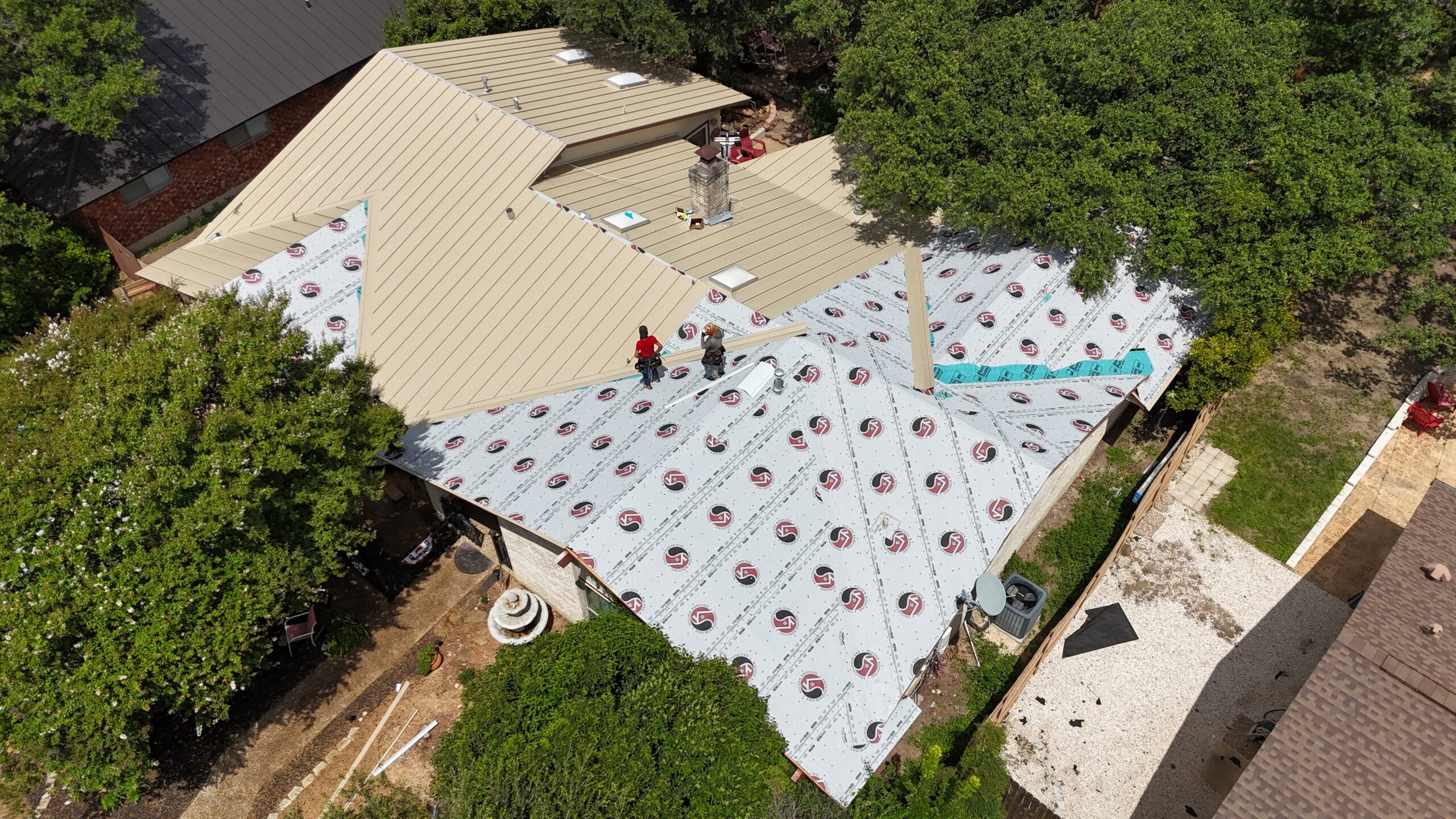 Aerial view of standing seam metal roof installation by Wilson Roofing in Tampa Bay